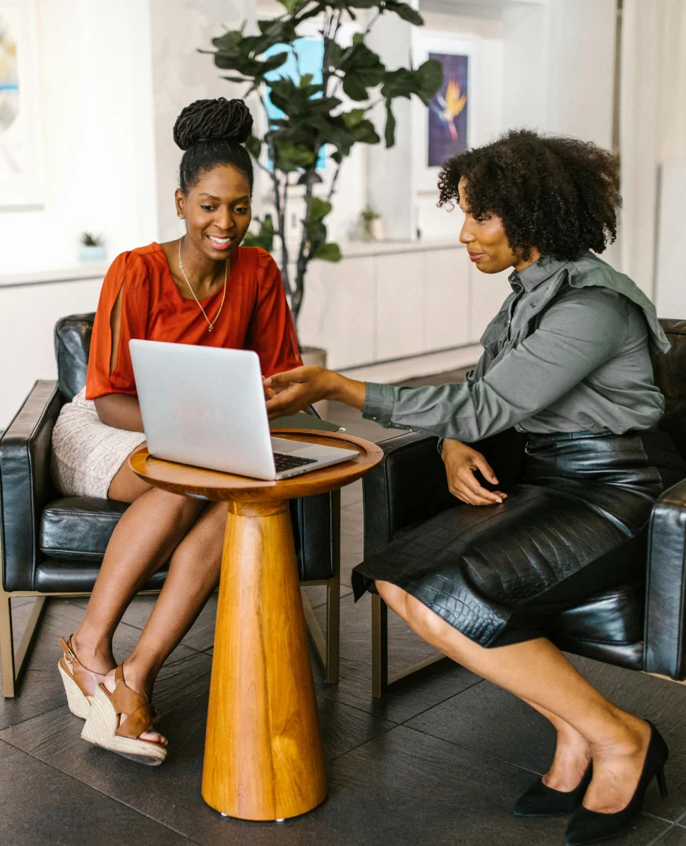 Ad-frican Women's Collective members engaged in a community gathering and networking event